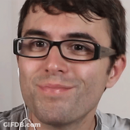 Man Wearing Glasses And Earbuds Smiling GIF
