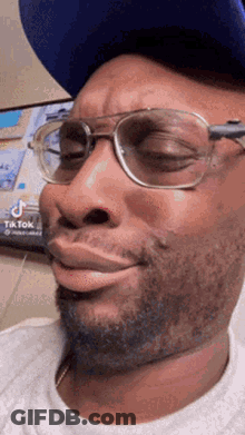Man Wearing Glasses And Hat GIF