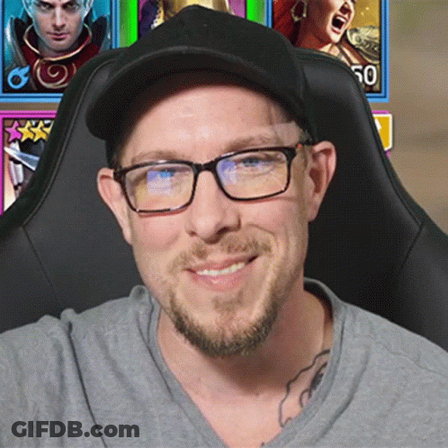 Man Wearing Glasses And Hat In Front Of Screen 50 GIF