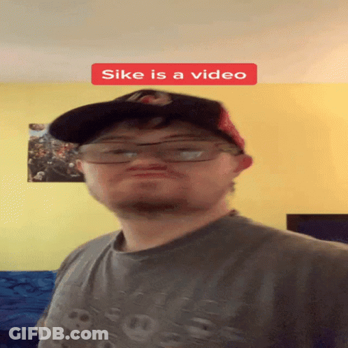 Man Wearing Glasses And Hat Saying Sike Is A Video GIF