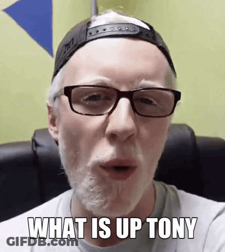 Man Wearing Glasses And Hat Saying What Is Up Tony GIF