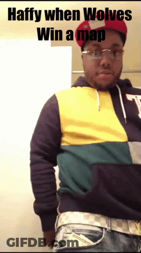 Man Wearing Glasses And Hat Says Haffy GIF