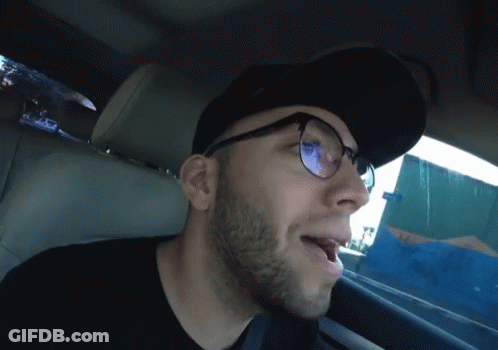 Man Wearing Glasses And Hat Yawning GIF