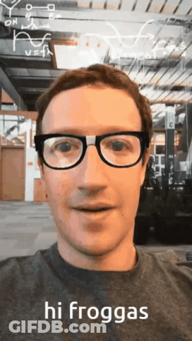 Man Wearing Glasses And Hi Froggas Shirt GIF