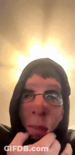 Man Wearing Glasses And Hoodie Making Face GIF