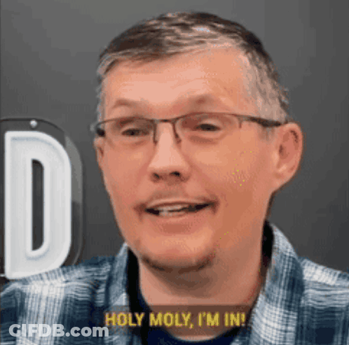 Man Wearing Glasses And Plaid Shirt Saying Holy Moly GIF