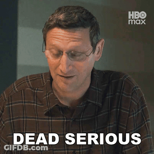 Man Wearing Glasses And Plaid Shirt Smiling GIF