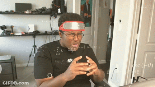 Man Wearing Glasses And Red Headband Looking At Phone GIF