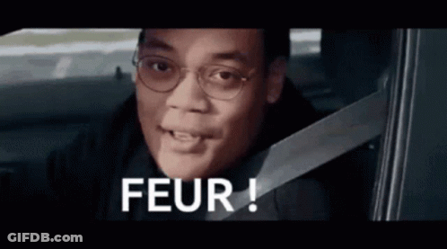 Man Wearing Glasses And Seat Belt In Car Saying Peur GIF