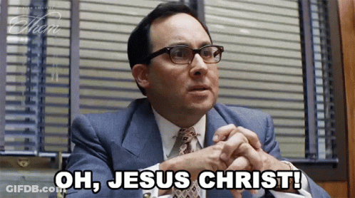 Man Wearing Glasses And Suit Says Oh Jesus Christ GIF