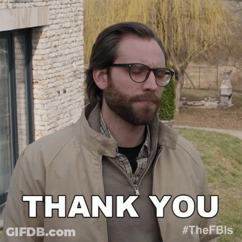Man Wearing Glasses And Tan Jacket Saying Thank You GIF