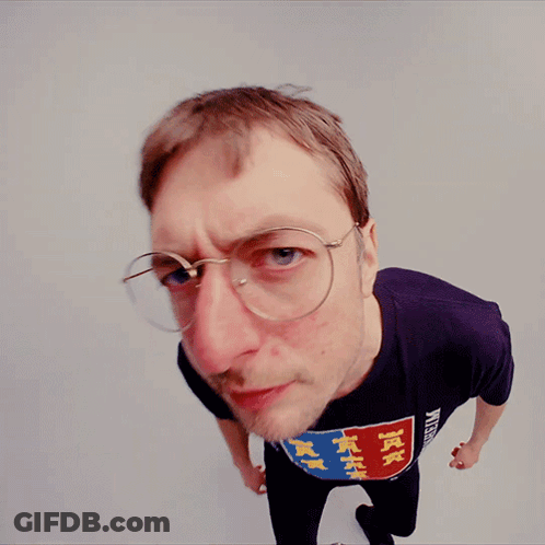 Man Wearing Glasses And Tax T-Shirt GIF