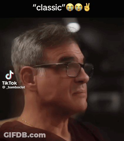 Man Wearing Glasses And TikTok Icon GIF