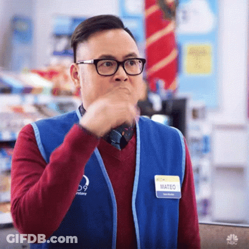 Man Wearing Glasses Covering Mouth GIF