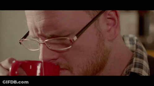 Man Wearing Glasses Drinking Coffee GIF