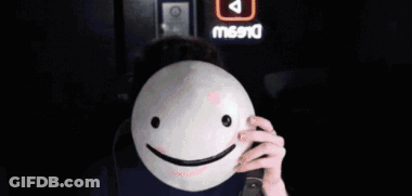 Man Wearing Glasses Holding Smiley Mask GIF
