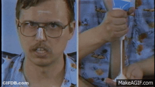 Man Wearing Glasses Holding Toothpaste GIF