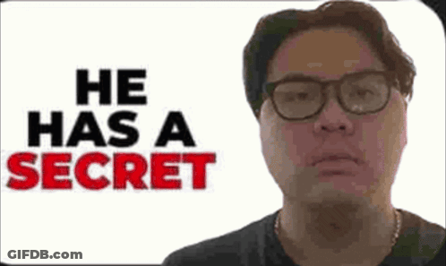 Man Wearing Glasses In Front Of Secret Sign GIF