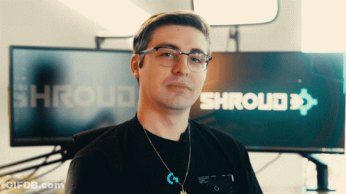 Man Wearing Glasses In Front Of Shroud Logo GIF