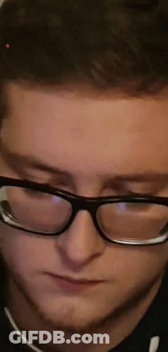Man Wearing Glasses Making Funny Face GIF