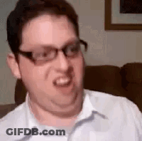 Man Wearing Glasses Making Funny Face GIF