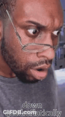Man Wearing Glasses Making Funny Face GIF