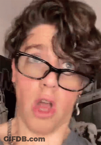 Man Wearing Glasses Making Funny Face GIF