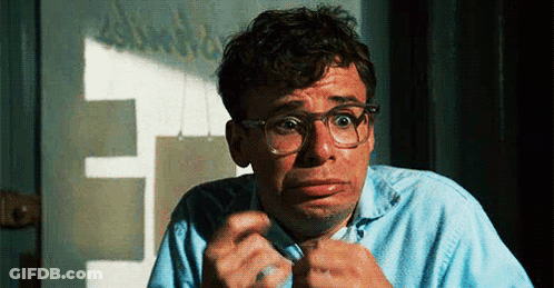 Man Wearing Glasses Making Funny Face GIF