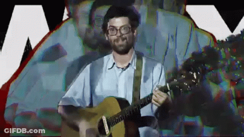 Man Wearing Glasses Playing Guitar GIF