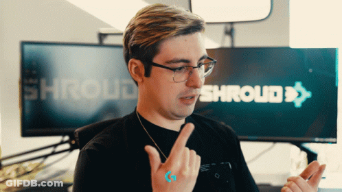 Man Wearing Glasses Pointing At Shroud Sign GIF