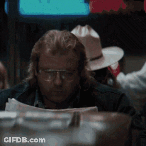 Man Wearing Glasses Reading Newspaper GIF