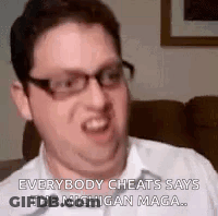 Man Wearing Glasses Saying Everybody Cheats GIF