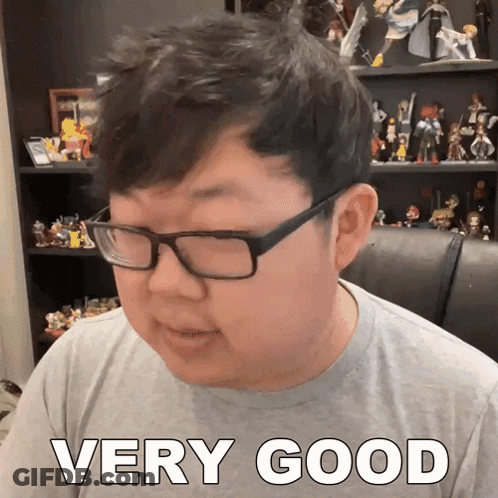 Man Wearing Glasses Saying Very Good GIF