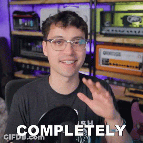 Man Wearing Glasses Says Completely While Waving GIF