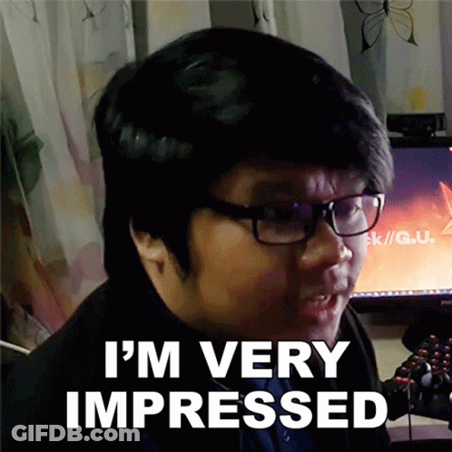 Man Wearing Glasses Says I'm Very Impressed In Front Of Computer Monitor GIF
