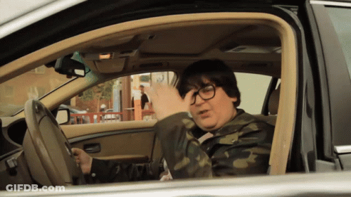 Man Wearing Glasses Sitting In Car GIF