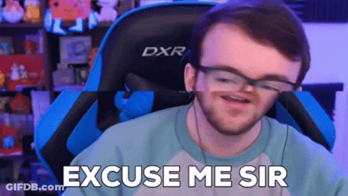 Man Wearing Glasses Sitting In Gaming Chair GIF