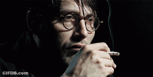 Man Wearing Glasses Smoking Cigarette GIF