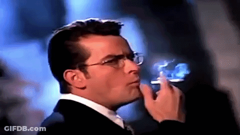 Man Wearing Glasses Smoking Cigarette GIF
