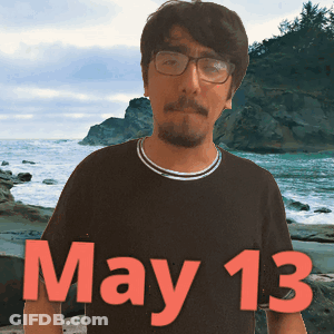 Man Wearing Glasses With May 13 Shirt GIF