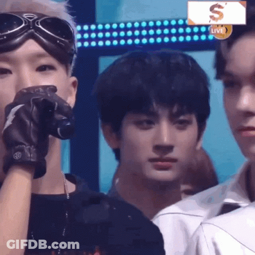 Man Wearing Goggles Holding Microphone GIF