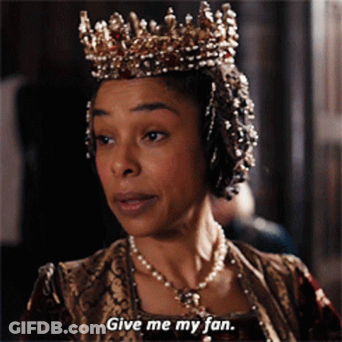 Man Wearing Gold Crown With Green Stone GIF