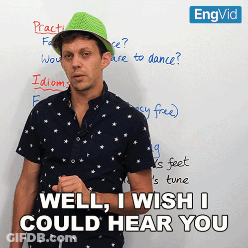 Man Wearing Green Hat In Front Of White Board With Well I Wish I Could Hear You GIF