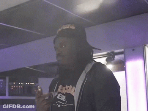 Man Wearing Hat And A&E Shirt GIF