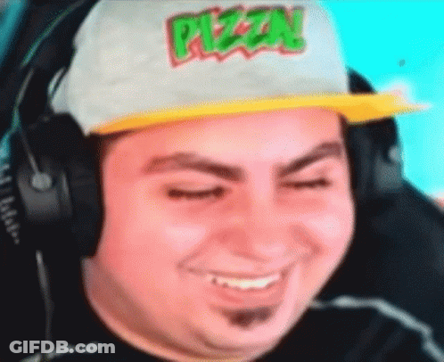 Man Wearing Hat And Headphones Making Funny Face GIF