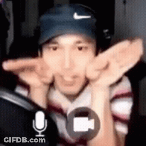 Man Wearing Hat And Headphones Singing GIF