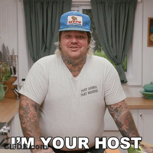 Man Wearing Hat And Part Animal Part Machine Shirt GIF