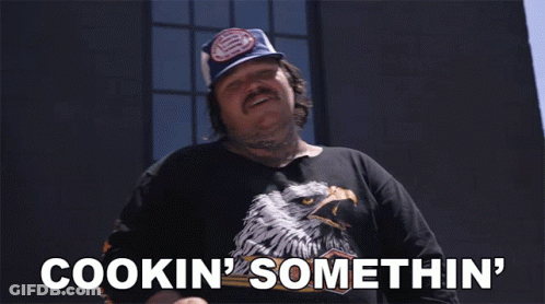 Man Wearing Hat And Shirt Saying Cookin Somethin GIF