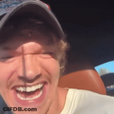 Man Wearing Hat And White Shirt Smiling GIF