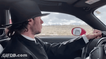 Man Wearing Hat Driving Car GIF